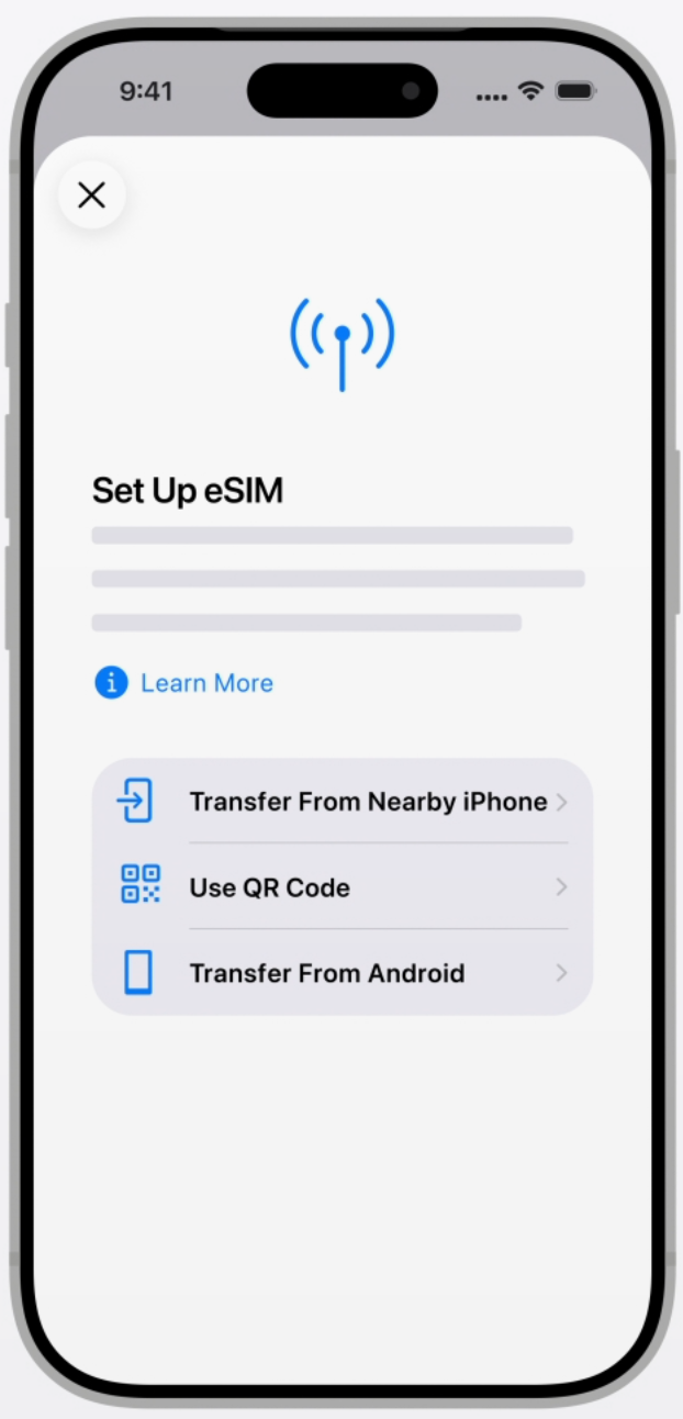 iPhone setup screen with the Use QR Code option